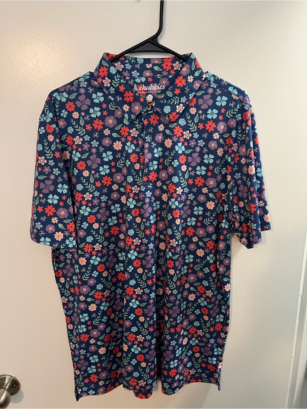 chubbies Navy Floral Polo with Red and Pink Blooms